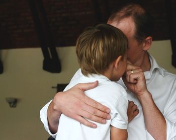 Father and son baby at home