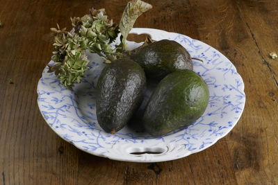 High angle view of fruits in plate on table