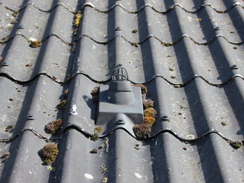 High angle view of water pipe on roof