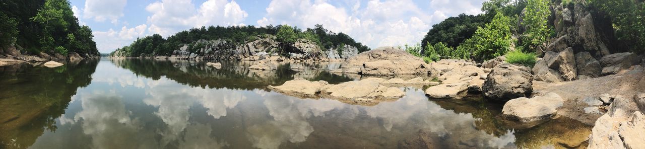 reflection, sky, nature, cloud - sky, water, tranquil scene, beauty in nature, tranquility, tree, no people, rock - object, scenics, day, waterfront, outdoors, lake, physical geography