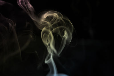 Close-up of smoke against black background