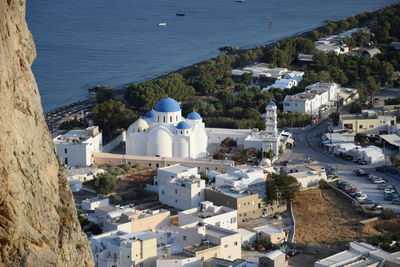 High angle view of townscape by sea