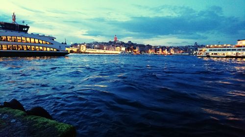 View of sea with buildings in background