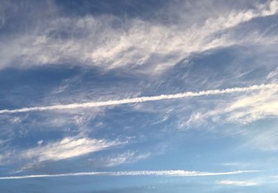 Aerial view of vapor trail in sky