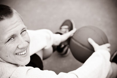 Close-up portrait of smiling mid adult man