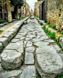 Narrow alley along buildings