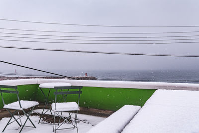 Scenic view of snow covered landscape against sky