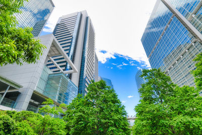 Low angle view of modern buildings against sky