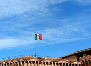 Low angle view of flag against sky