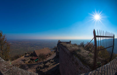 Panoramic view of sea against clear blue sky