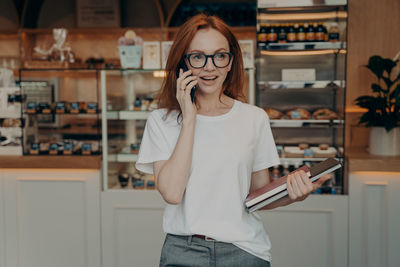 Young woman using mobile phone