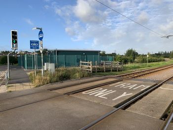 Railroad station platform against sky