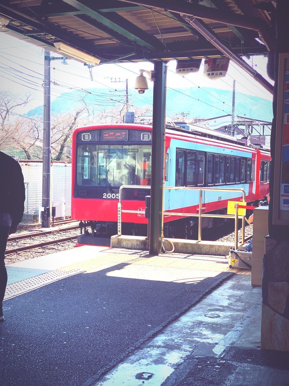 TRAIN IN RAILROAD STATION