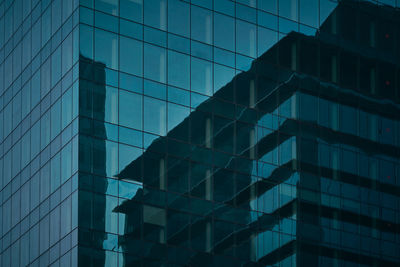 Low angle view of modern buildings in city