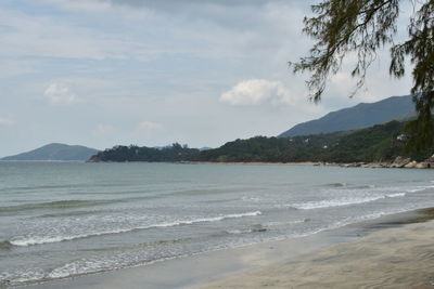 Scenic view of beach against sky