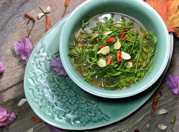 High angle view of chopped vegetables in bowl on table