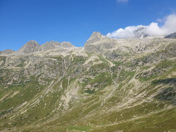 Low angle view of mountain range against sky