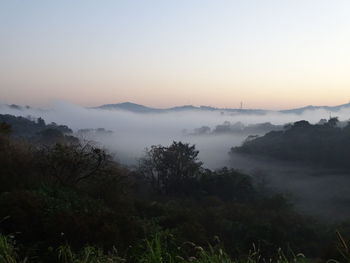 Scenic view of landscape against sky during sunset