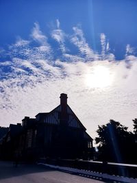 Low angle view of building against sky during sunset