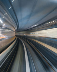 Blurred motion of illuminated railroad tracks