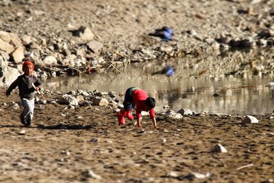 People working in mud