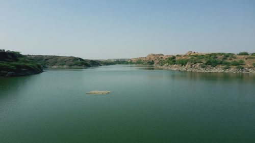 Scenic view of lake against clear sky