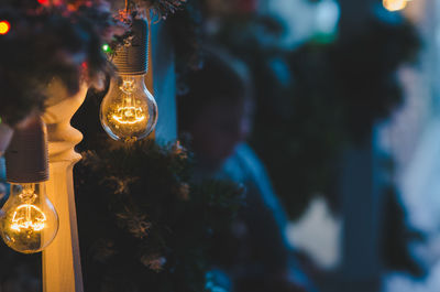 Close-up of illuminated light bulb