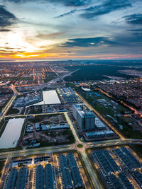 Aerial view of cityscape during sunset