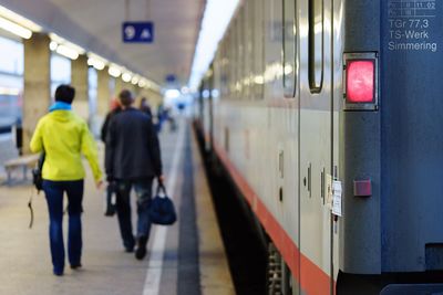 People at railroad station