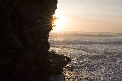 Scenic view of sea at sunset