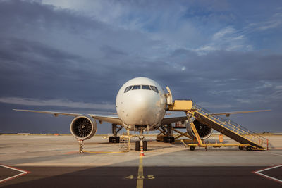 Airport runway against sky