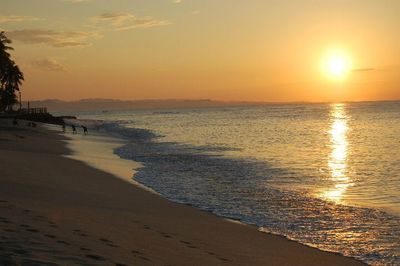 Scenic view of sea at sunset