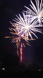 Low angle view of firework display