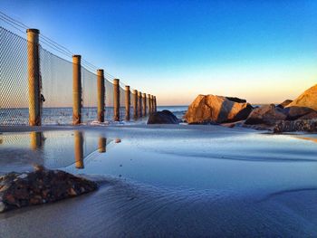 Scenic view of sea against clear sky