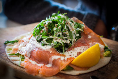 Smoked salmon salad on flatbread