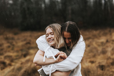 Young couple standing outdoors