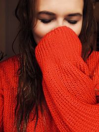 Close-up of woman wearing sweater