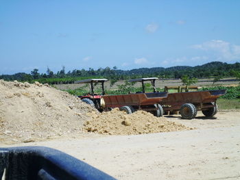 View of construction site on field against sky