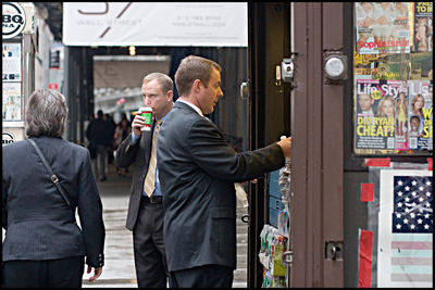 Men standing in store