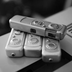 High angle view of old cameras on table