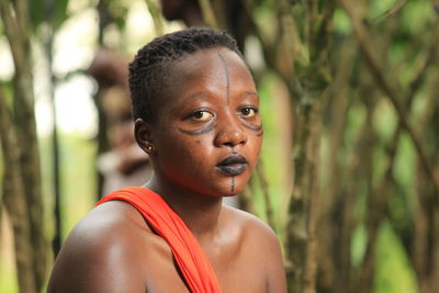 Side view of young womanlooking away