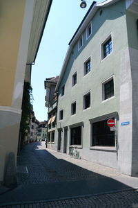 View of buildings in city against sky