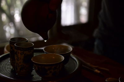 Close-up of coffee cup on table