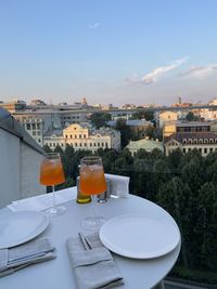 View of tea served on table against buildings