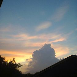 High section of building at sunset