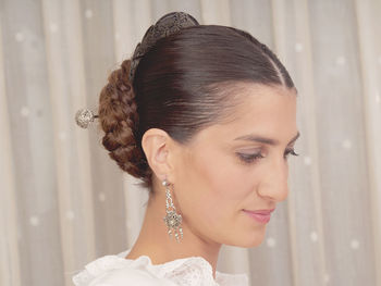 Close-up of bride wearing earring