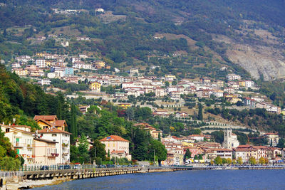 Aerial view of townscape by sea