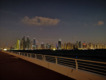 Dubai marina visible from the palm by night