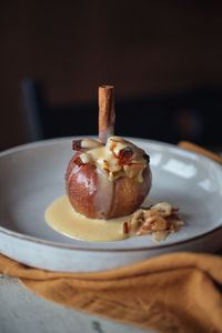 Close-up of baked apple on plate