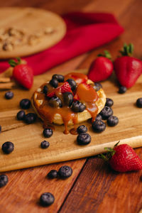 High angle view of strawberries on table